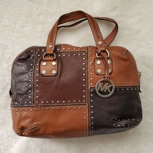 Michael Kors brown patch leather studded top handle bag